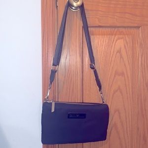 Calvin Klein navy blue purse/ like new/ adjustable strap. Lots of pockets!